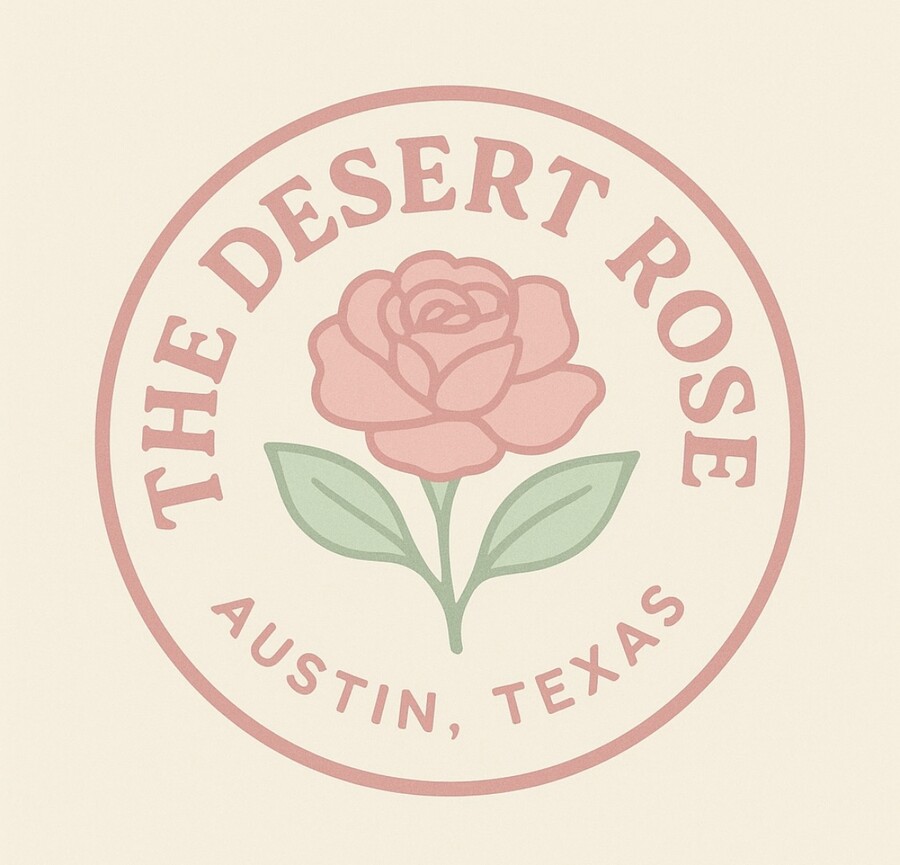 The Desert Rose logo, a rose and cactus leaves inside a circular badge